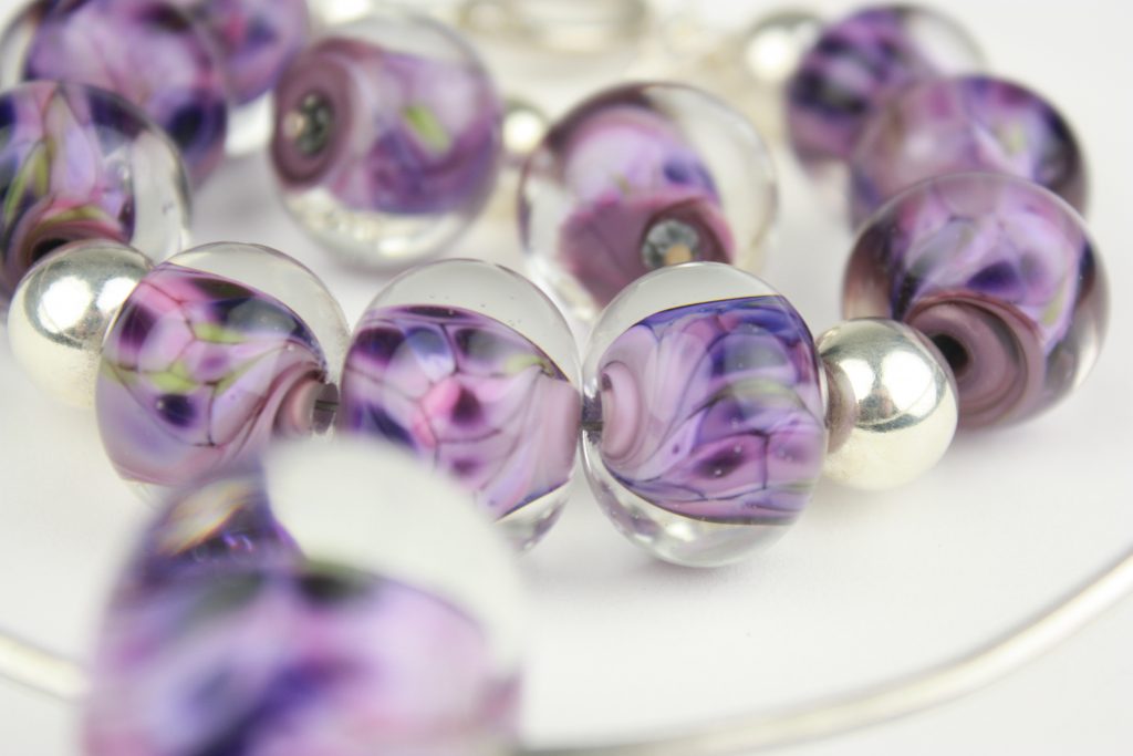 Adrienne Yeardye Glass Wild orchid bracelet background